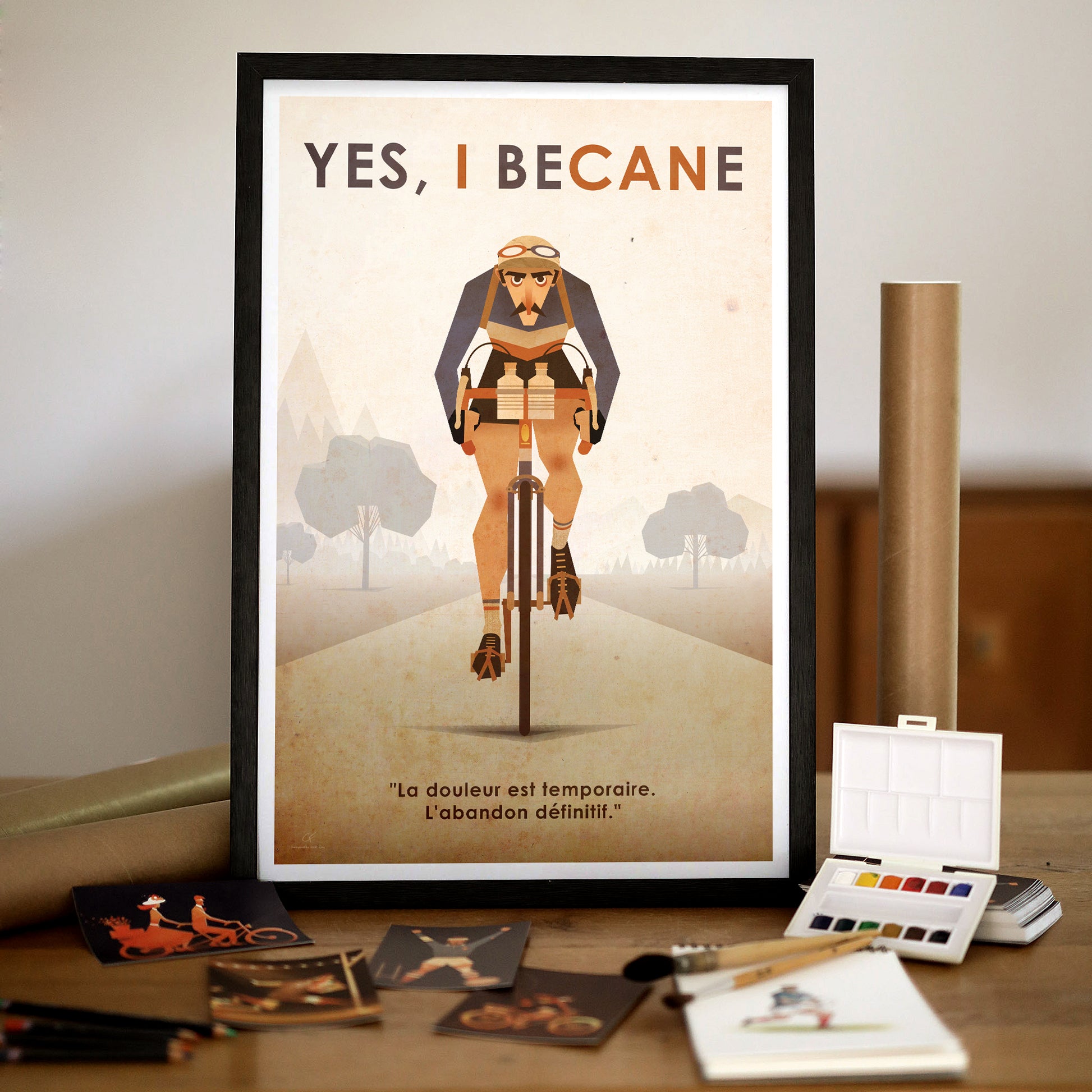 Affiche déco vélo style vintage accrochée au mur, cycliste rétro avec citation motivation « La douleur est temporaire, l’abandon définitif »