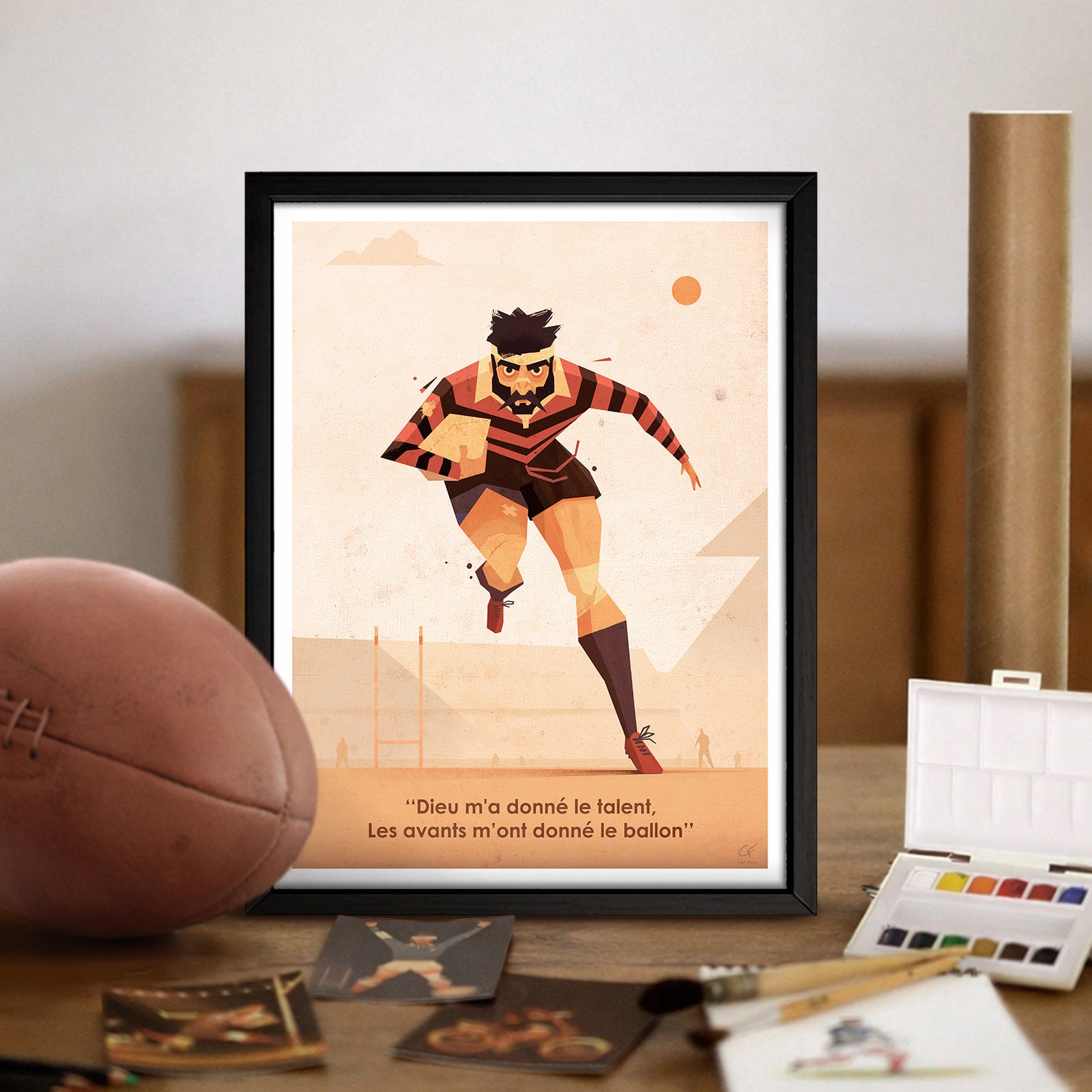 Affiche rugby vintage Rouge et Noir mise en scène dans une décoration intérieure avec ballon et accessoires de rugby, idéale pour une décoration murale sportive et rétro.